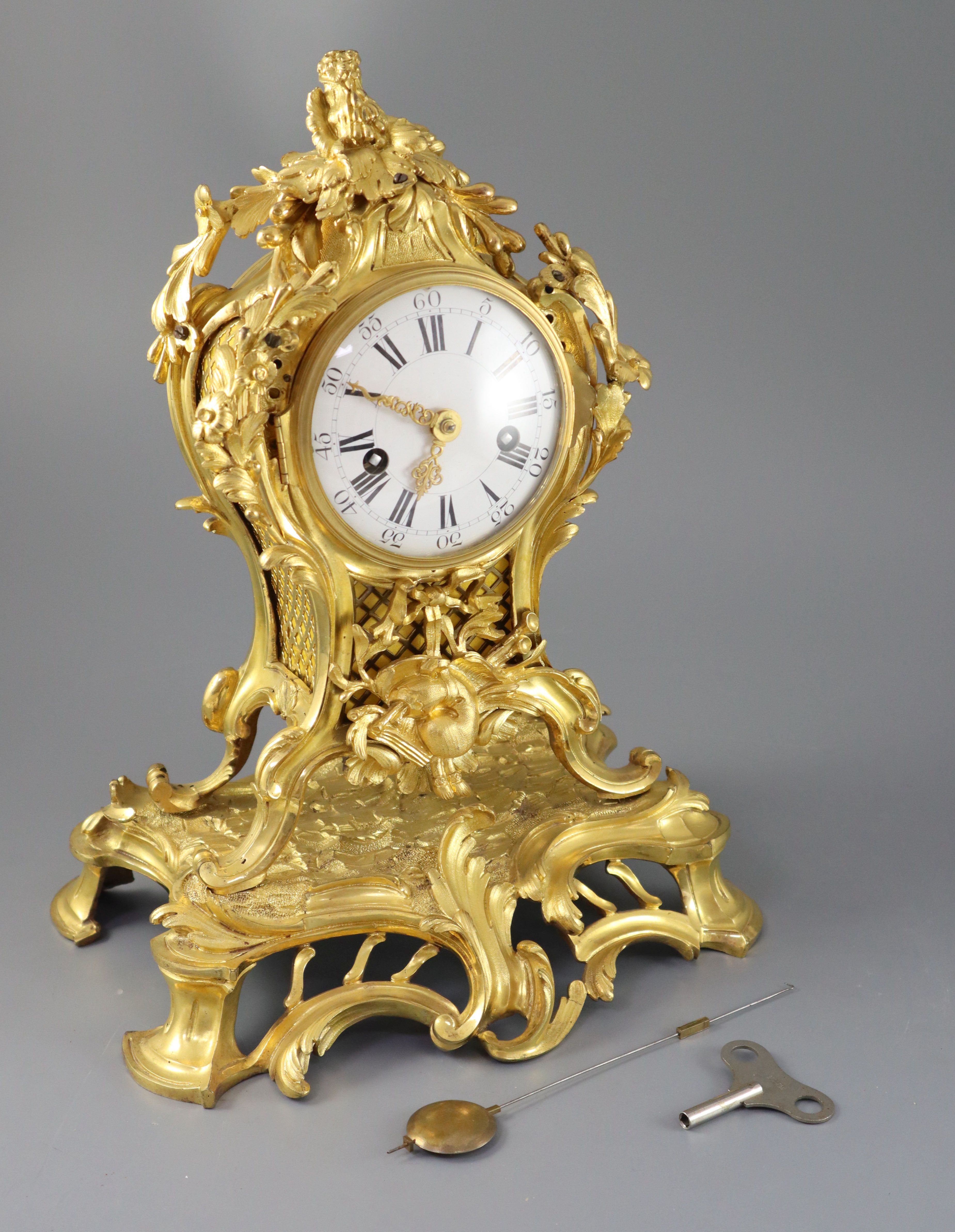 A mid 18th century French ormolu mantel clock, height 15in.